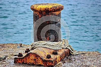 Rusty dock bollard Stock Photo