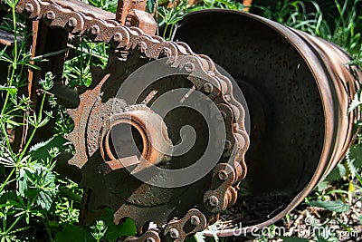 Rusty driving gears with chain on a old mine train wagon Stock Photo