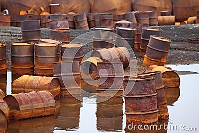 Rusty fuel and chemical drums Stock Photo