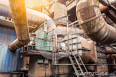 Rusty industrial pipelines in Steel mills Stock Photo