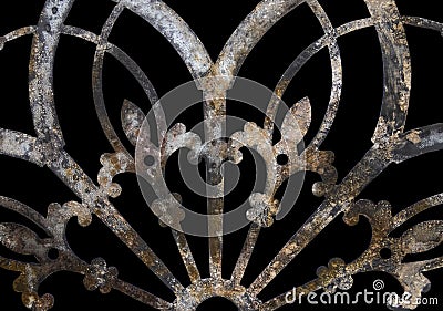 Rusty iron grunge lacy metal decoration with fleur-de-lis isolated on black Stock Photo