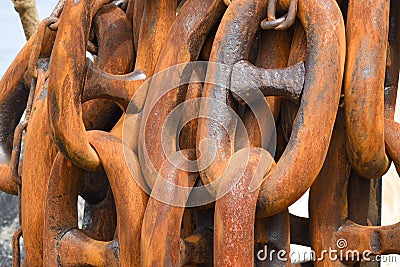 Rusty links of heavy industrial chain Stock Photo