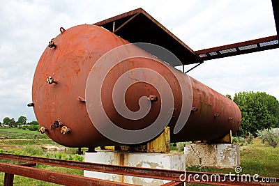 Rusty liquified gas cylinder Stock Photo