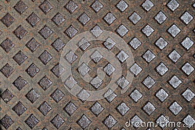 Rusty manhole pattern closeup, useful as background Stock Photo