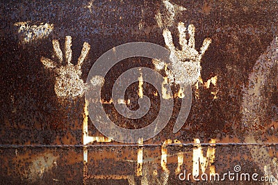 Rusty metal with handprint Stock Photo