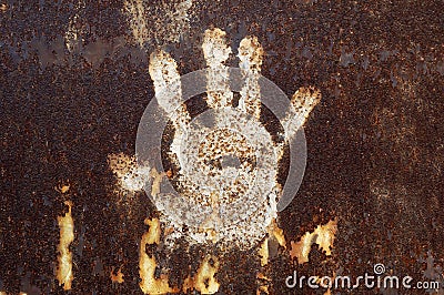 Rusty metal with handprint Stock Photo