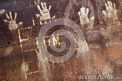 Rusty metal with handprint Stock Photo