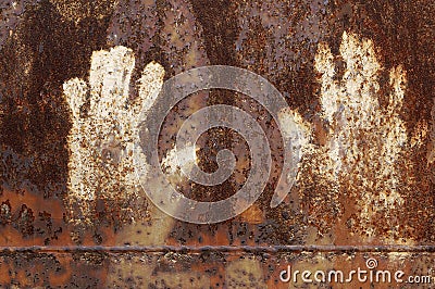 Rusty metal with handprint Stock Photo