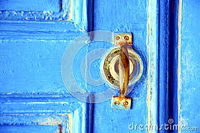 rusty metal nail dirty stripped paint in the knocker Stock Photo