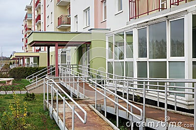 A rusty metal ramp for wheelchairs Stock Photo