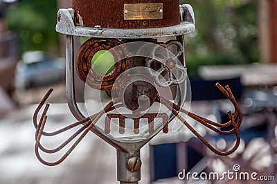 Rusty metal robot, made of spare parts Stock Photo
