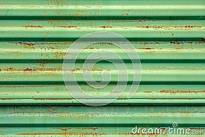 Rusty metal surface painted in green Stock Photo