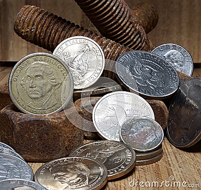 Rusty nuts and bolts and U.S. coins Stock Photo
