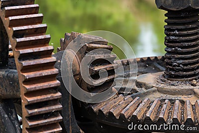 Rusty and oily water gate gear. Stock Photo