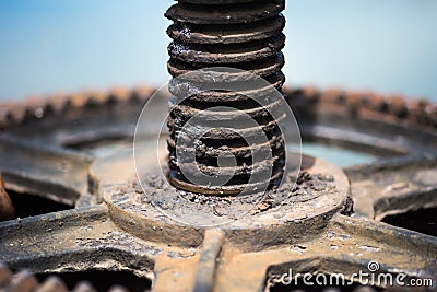 Rusty and oily water gate gear. Stock Photo