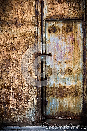 Rusty old brown metal door Stock Photo