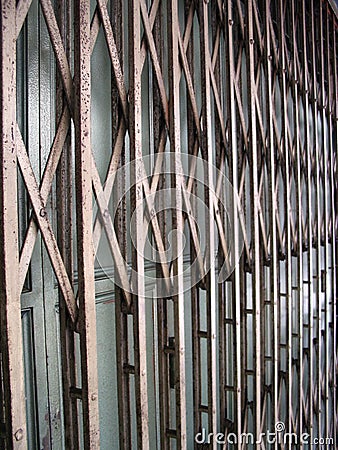 Rusty old foldable gate Stock Photo