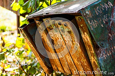 The rusty old mailboxes on the autumn nature. Abandoned iron mailboxes with house numbers Stock Photo