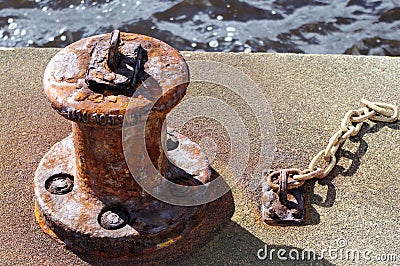 Rusty Old Mooring Bollard Stock Photo