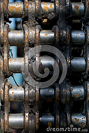 Rusty piece of engine chain from an old machine Stock Photo