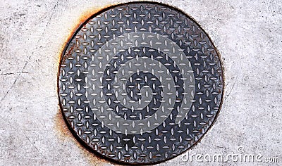 Rusty Round Man Hole made of Diamond Steel Plate Stock Photo