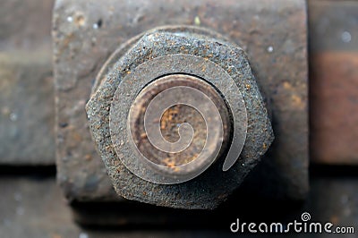 Rusty screw on the raily train Stock Photo