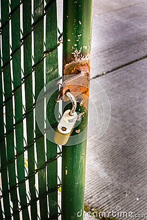 Rusty security gate open Stock Photo
