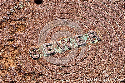 Rusty Sewer Cover Stock Photo