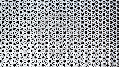 Rusty silver metal background with round holes. Metal texture with holes. Iron gray perforated background. Steel durable Stock Photo