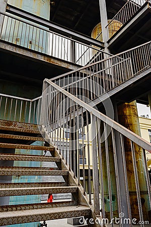 Rusty stairway in abandoned factory Stock Photo