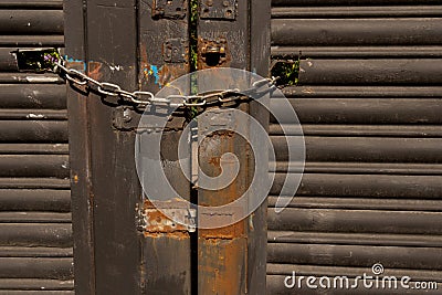 rusty steel gate massive chain burglary protection Stock Photo