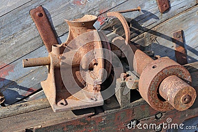 Rusty vintage small agricultural machine parts Stock Photo