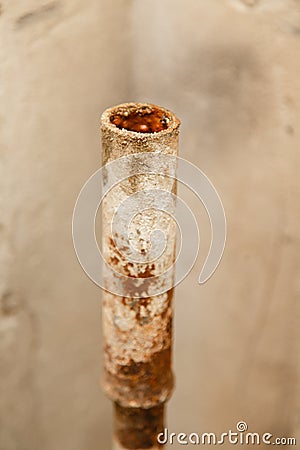 Rusty water pipe after thirty years of operation. Stock Photo