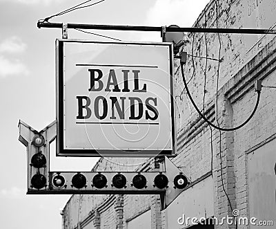 Aging Vintage Sign in Front of Small Town Bail Bonds Office Editorial Stock Photo