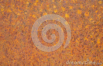 Rusty yellow metal surface. Saturated orange, red, grunge rusty metal texture background. Stock Photo