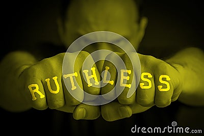 RUTHLESS written on an angry man fists Stock Photo