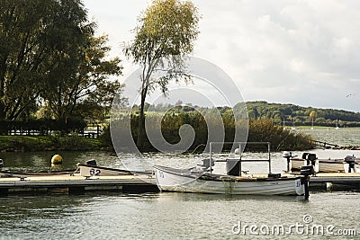 Rutland, U.K. October 19,2019 - boats on the lake, autumn day at Rutland water lake Editorial Stock Photo