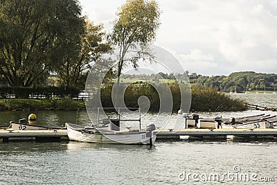 Rutland, U.K. October 19,2019 - boats on the lake, autumn day at Rutland water lake Editorial Stock Photo