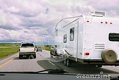 RV and cars on road Stock Photo