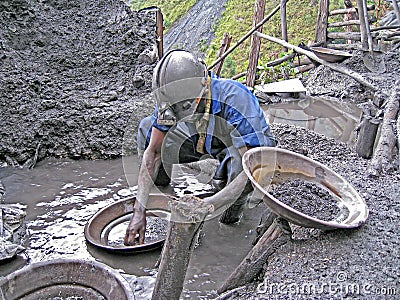 Rwandan Miner Panning For Precious Metals Editorial Stock Photo