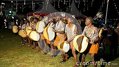 Rwandan and Ugandan dancers performing traditional African dances at the wedding in the evening Editorial Stock Photo