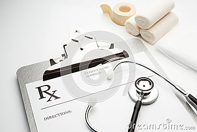 Rx prescription on clipboard with stethoscope Stock Photo