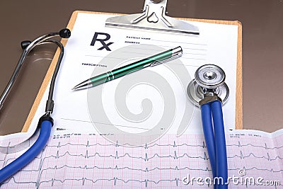 RX prescription, Red heart, asorted pils and a stethoscope on white background Stock Photo