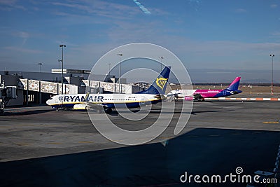 Ryanair Boeing 737-8AS EI-EKT and WizzAir Airbus A320 HA-LWK airplanes at Budapest international airport together. stock photo Editorial Stock Photo