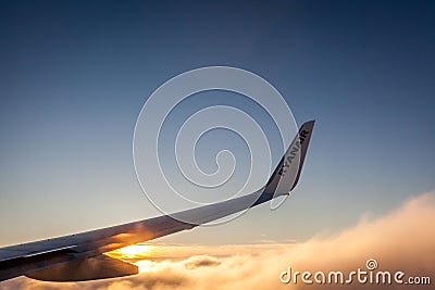 Ryanair wing at sunset Editorial Stock Photo