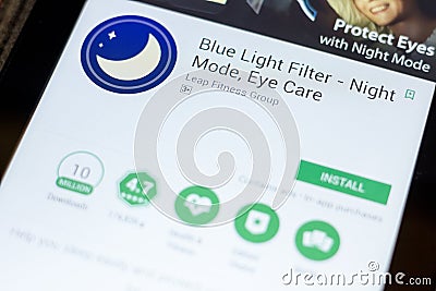 Ryazan, Russia - July 03, 2018: Blue Light Filter - Night Mode, Eye Care mobile app on the display of tablet PC. Editorial Stock Photo
