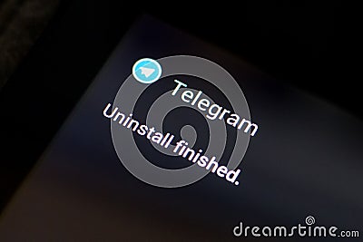Ryazan, Russia - May 03, 2018: Uninstall Telegram app message window on the display of tablet PC. Editorial Stock Photo