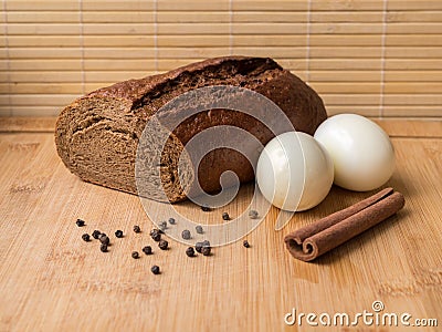 The rye bread, cinnamon and eggs. Stock Photo