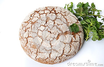 Rye bread loaf with nettle leaves Stock Photo