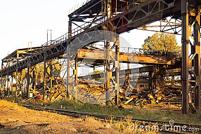 S Broom. Scrap metal loading. Mechanisms for loading scrap metal. Loading process. Stock Photo